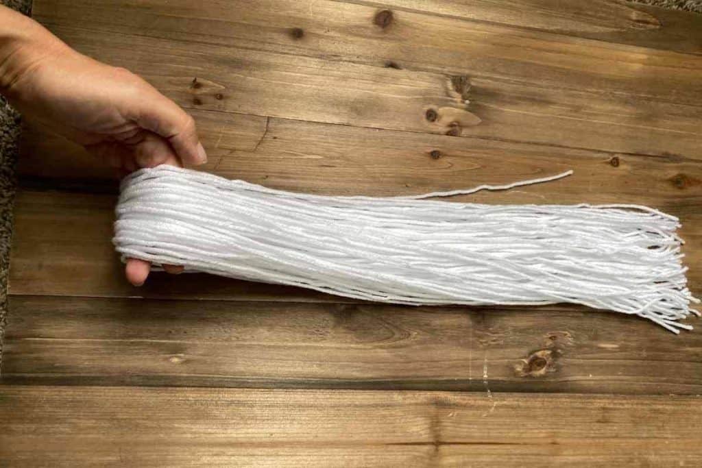 bunch of white yarn folded in half