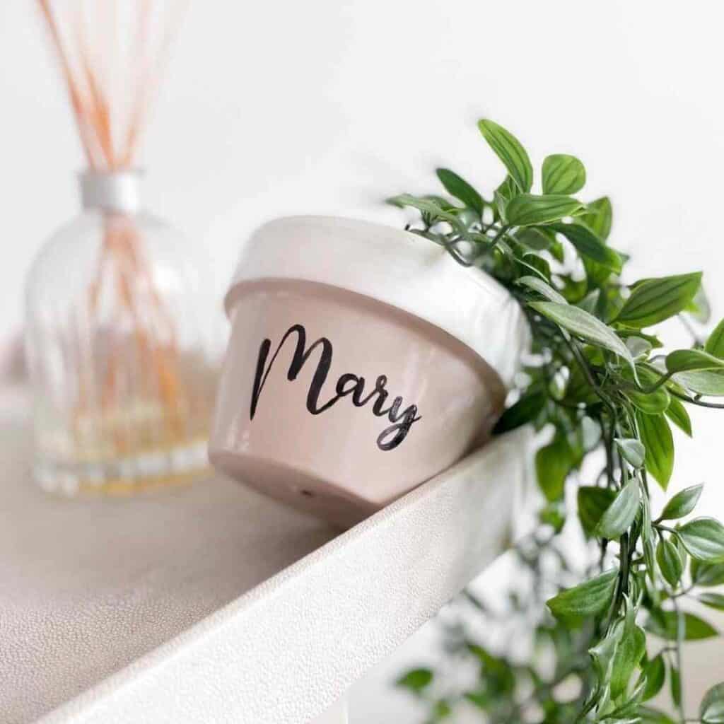 hand painted terra cotta pot with the name Mary on it