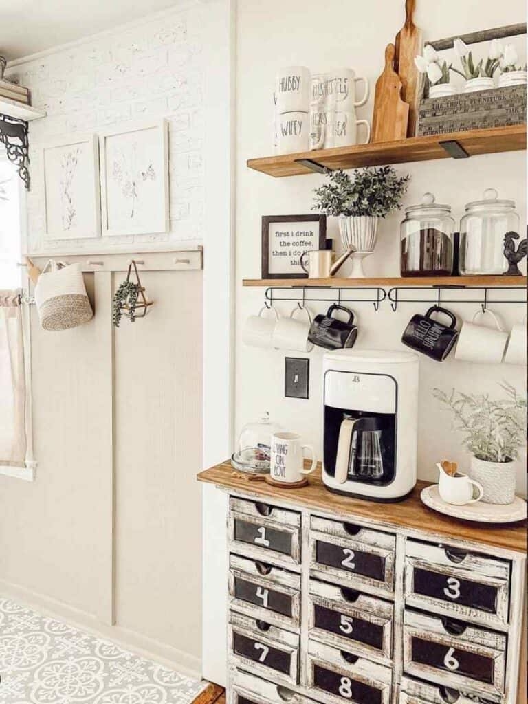 farmhouse coffee bar with drawers labeled 1 through 9 and two wood shelves above
