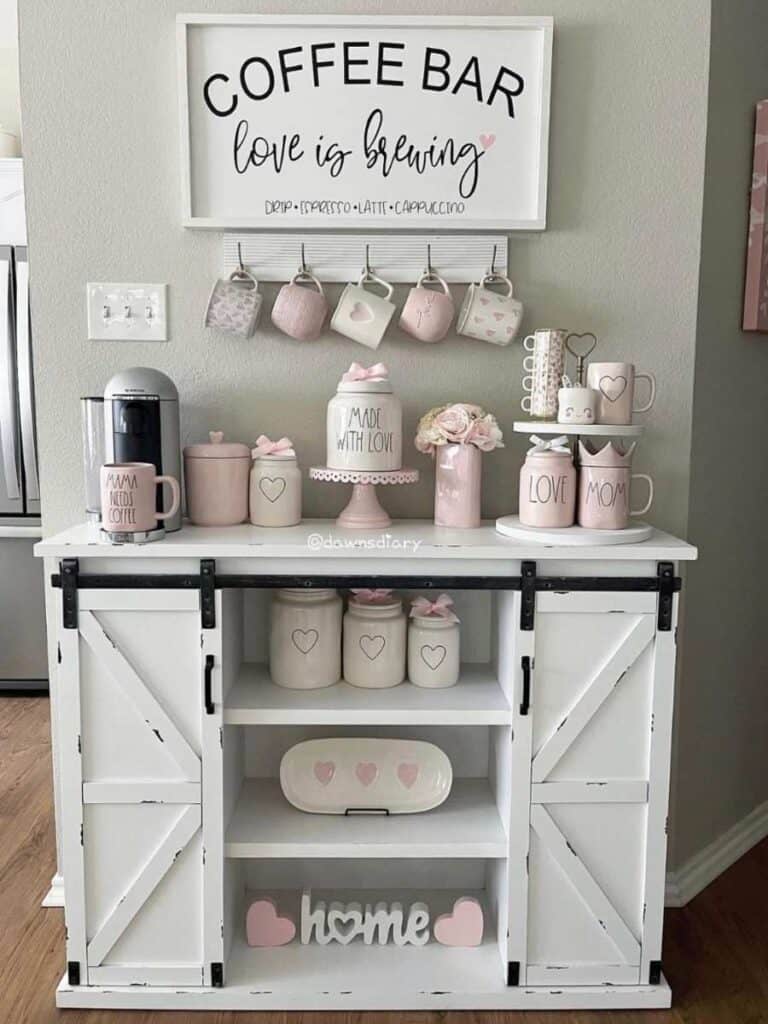love themed coffee bar with pink white and hearts mugs