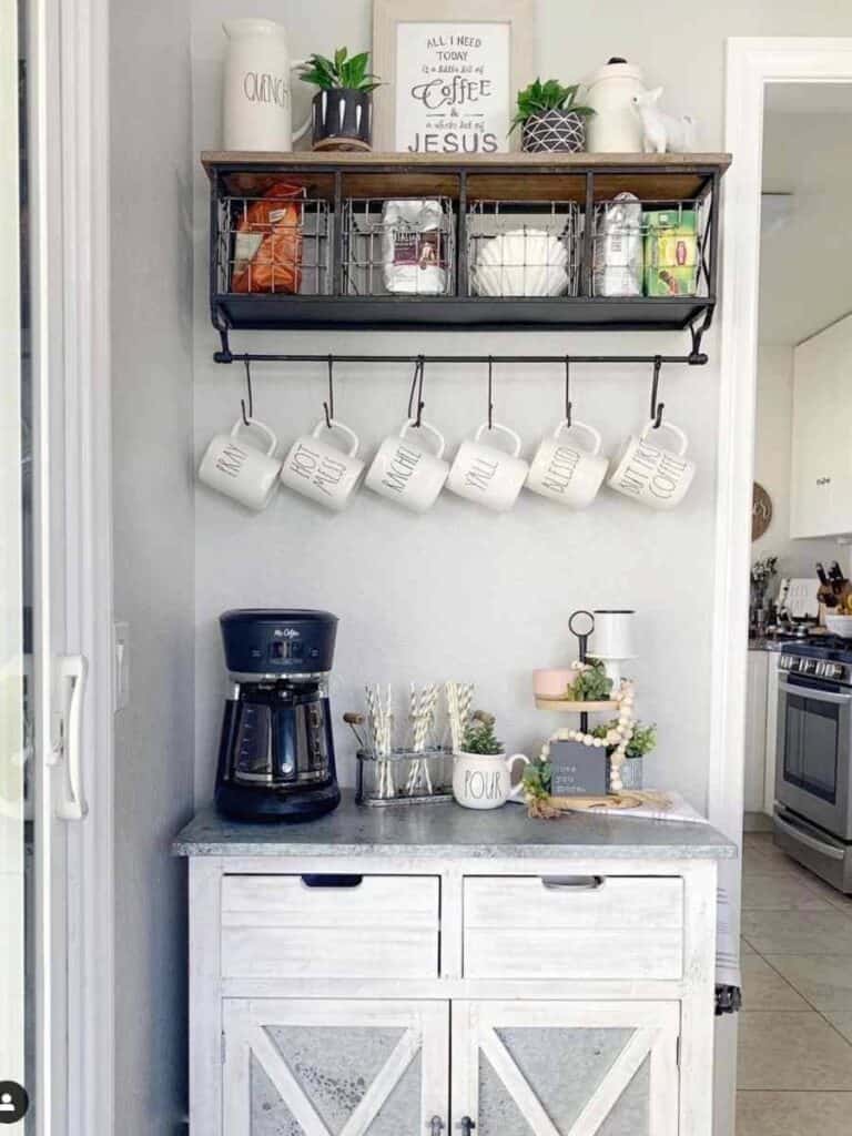 coffee bar with wired shelf and hanging mugs