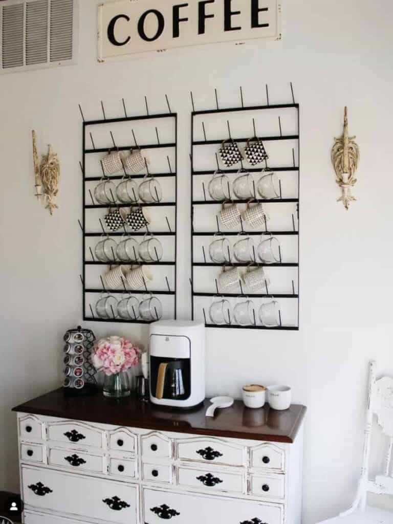 coffee bar cabinet with vertical coffee cups up the wall