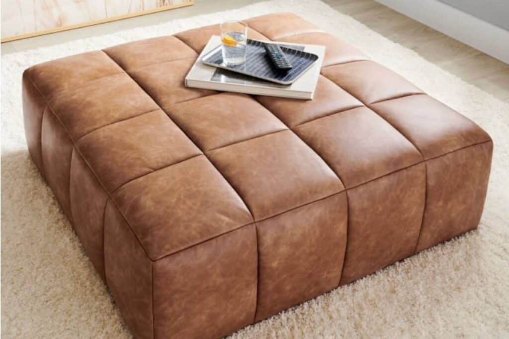 square tan faux leather ottoman