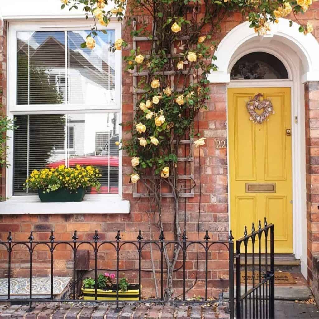 brick house with yellow door